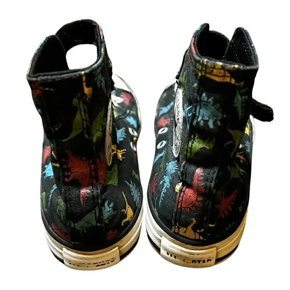 CONVERSE Kids Black hi top dinosaur lace and rip top closure. Pre owned size 3